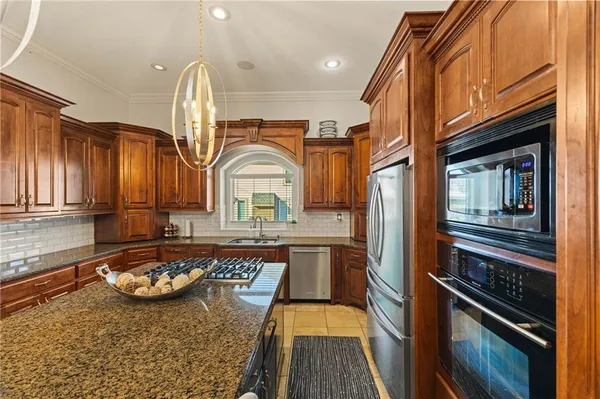 $999,000 | 2421 Northeast Lake Breeze Drive, Lee's Summit, MO 64086