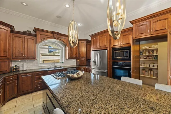 $999,000 | 2421 Northeast Lake Breeze Drive, Lee's Summit, MO 64086