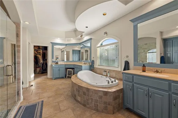 $999,000 | 2421 Northeast Lake Breeze Drive, Lee's Summit, MO 64086