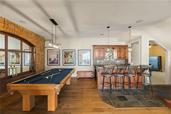 $999,000 | 2421 Northeast Lake Breeze Drive, Lee's Summit, MO 64086