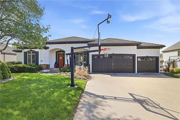 $999,000 | 2421 Northeast Lake Breeze Drive, Lee's Summit, MO 64086