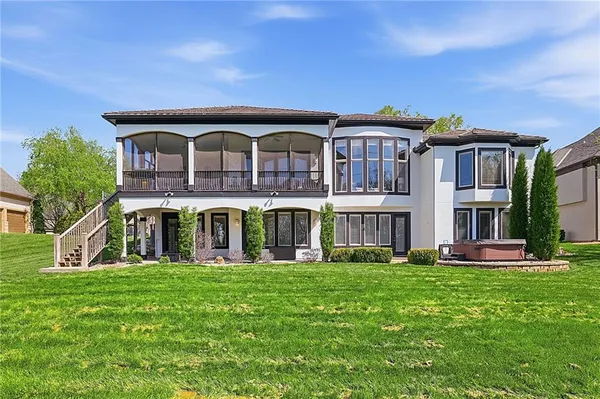 $999,000 | 2421 Northeast Lake Breeze Drive, Lee's Summit, MO 64086