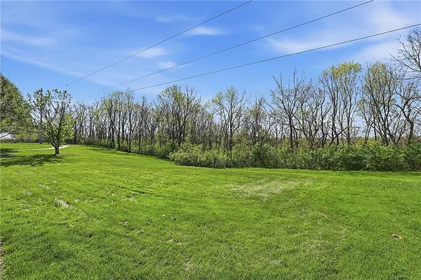 $999,000 | 2421 Northeast Lake Breeze Drive, Lee's Summit, MO 64086