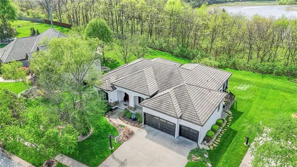 $999,000 | 2421 Northeast Lake Breeze Drive, Lee's Summit, MO 64086