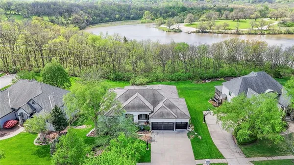 $999,000 | 2421 Northeast Lake Breeze Drive, Lee's Summit, MO 64086