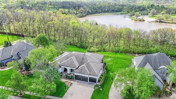 $999,000 | 2421 Northeast Lake Breeze Drive, Lee's Summit, MO 64086