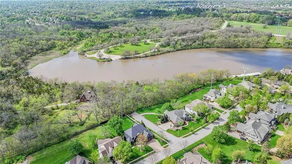 $999,000 | 2421 Northeast Lake Breeze Drive, Lee's Summit, MO 64086