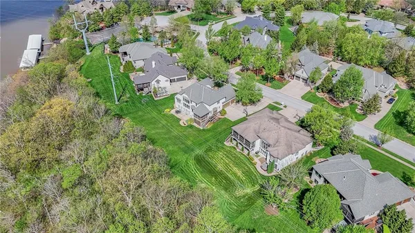 $999,000 | 2421 Northeast Lake Breeze Drive, Lee's Summit, MO 64086