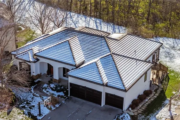 $999,000 | 2421 Northeast Lake Breeze Drive, Lee's Summit, MO 64086