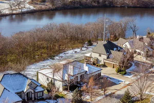 $999,000 | 2421 Northeast Lake Breeze Drive, Lee's Summit, MO 64086