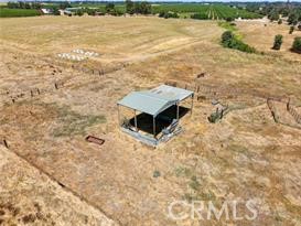 0 Inghram Road Corning, CA 96021 - Photo 2 of 8 a view of a lake with a mountain