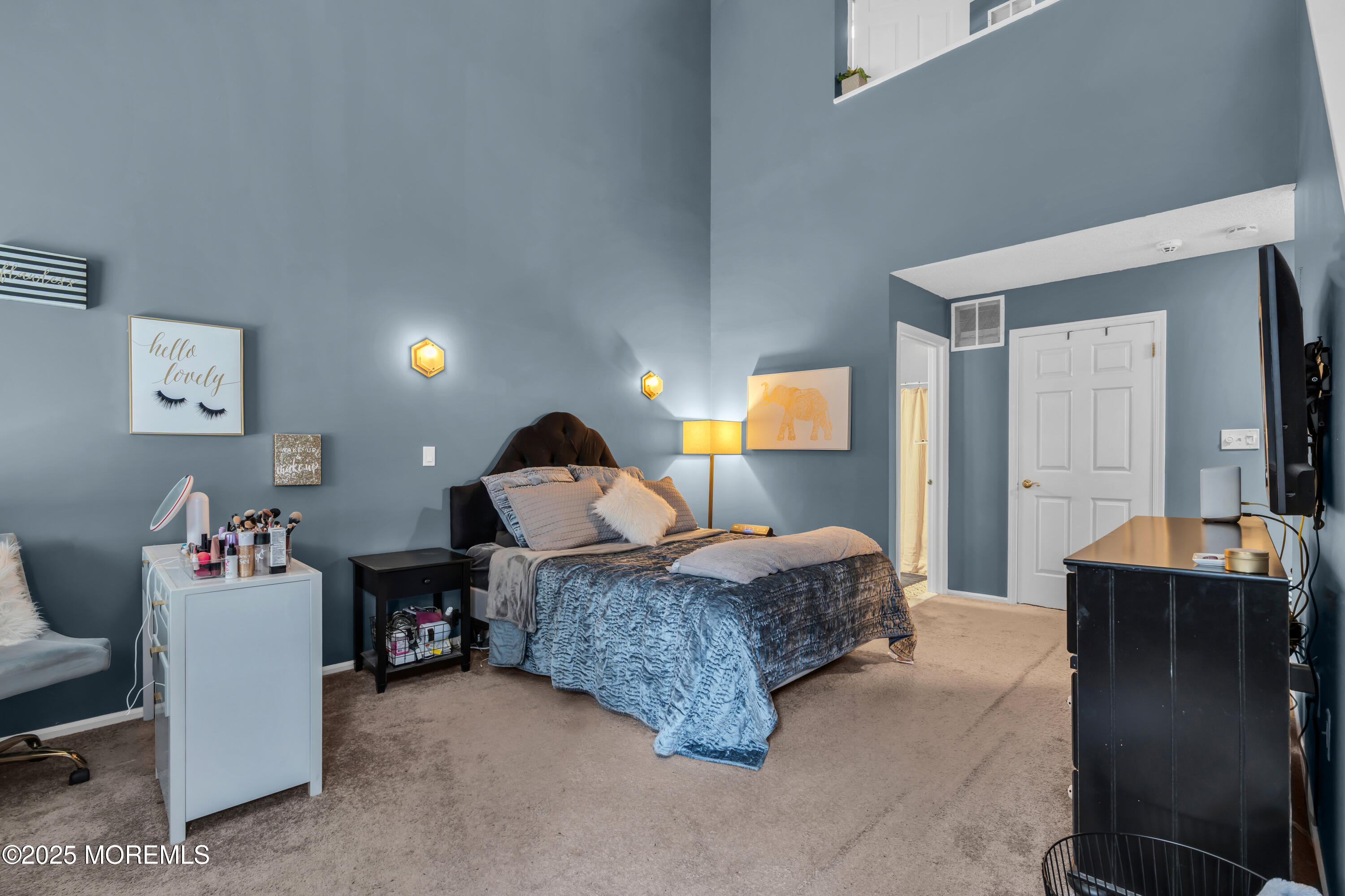 11 Madison Court Tinton Falls, NJ 07712 - Photo 15 of 24 a living room with furniture and a table