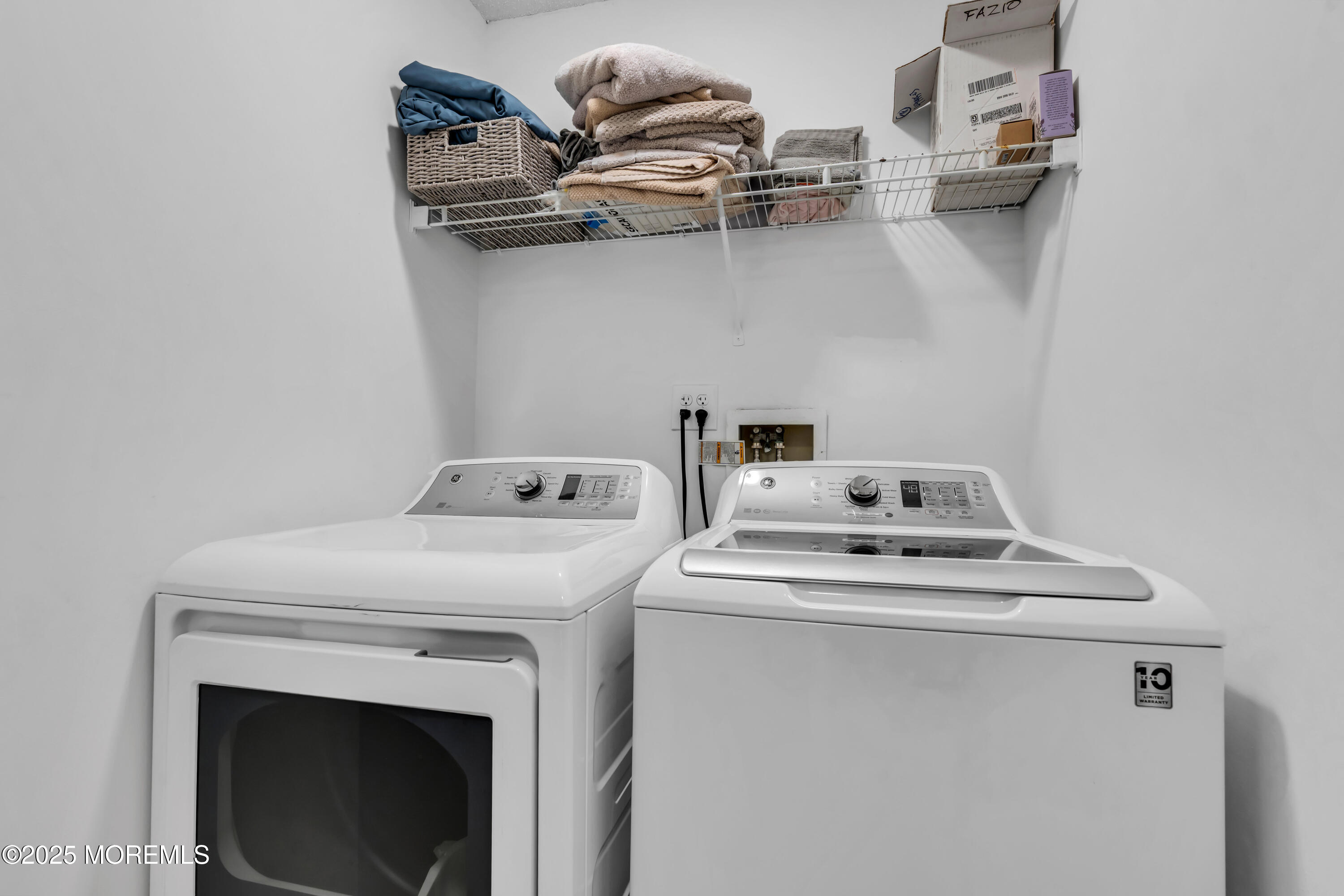 11 Madison Court Tinton Falls, NJ 07712 - Photo 21 of 24 a utility room with dryer and washer