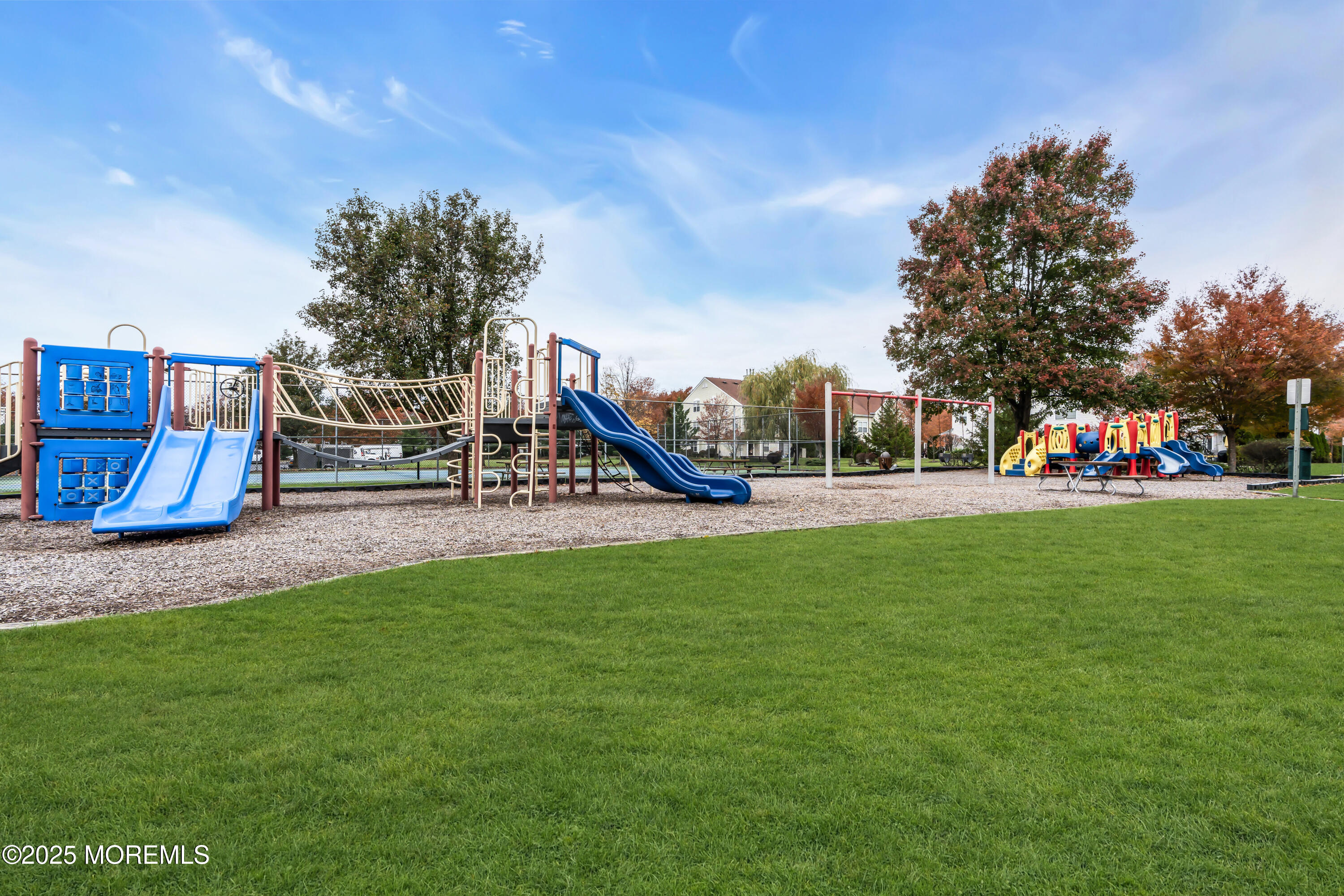 11 Madison Court Tinton Falls, NJ 07712 - Photo 24 of 24 a park with lots of swings and slides