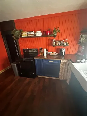 a bathroom with a double vanity sink and mirror