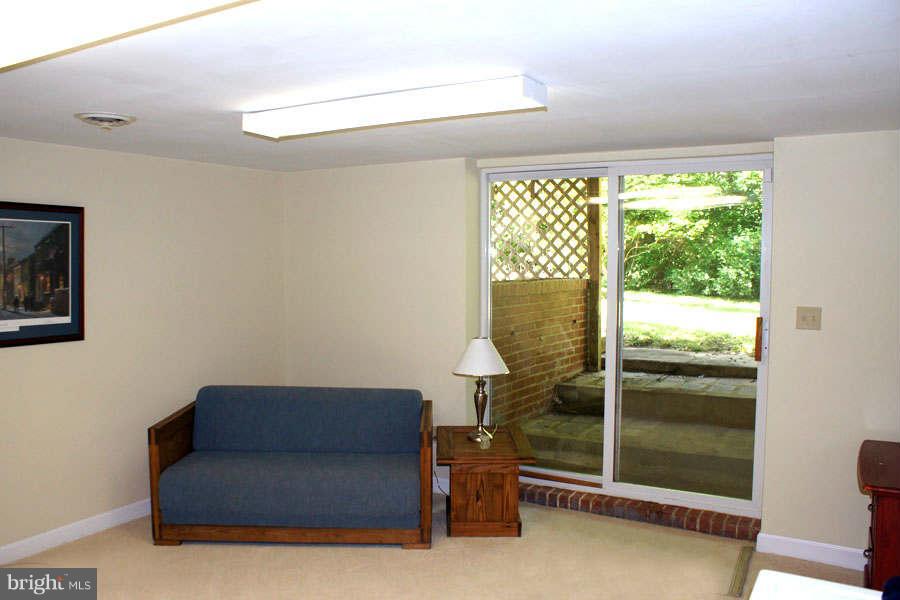 1201 Cedar Lane Edgewater, MD 21037 - Photo 29 of 30 Lower Level Walk-Out to Yard and Waterfront