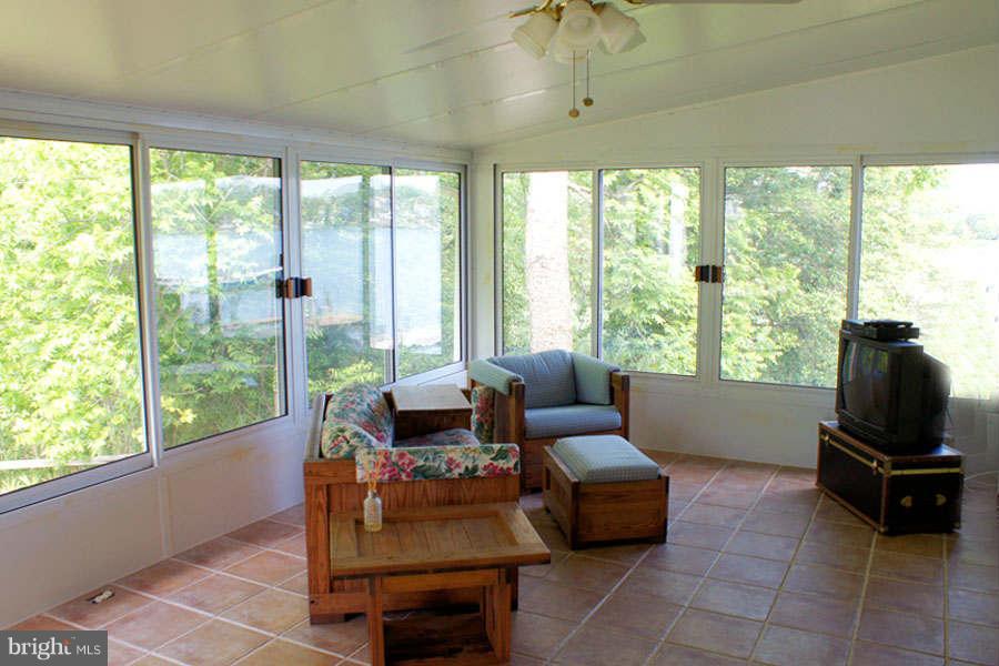 1201 Cedar Lane Edgewater, MD 21037 - Photo 6 of 30 Glass Encased Sunroom to Enjoy the Seasons