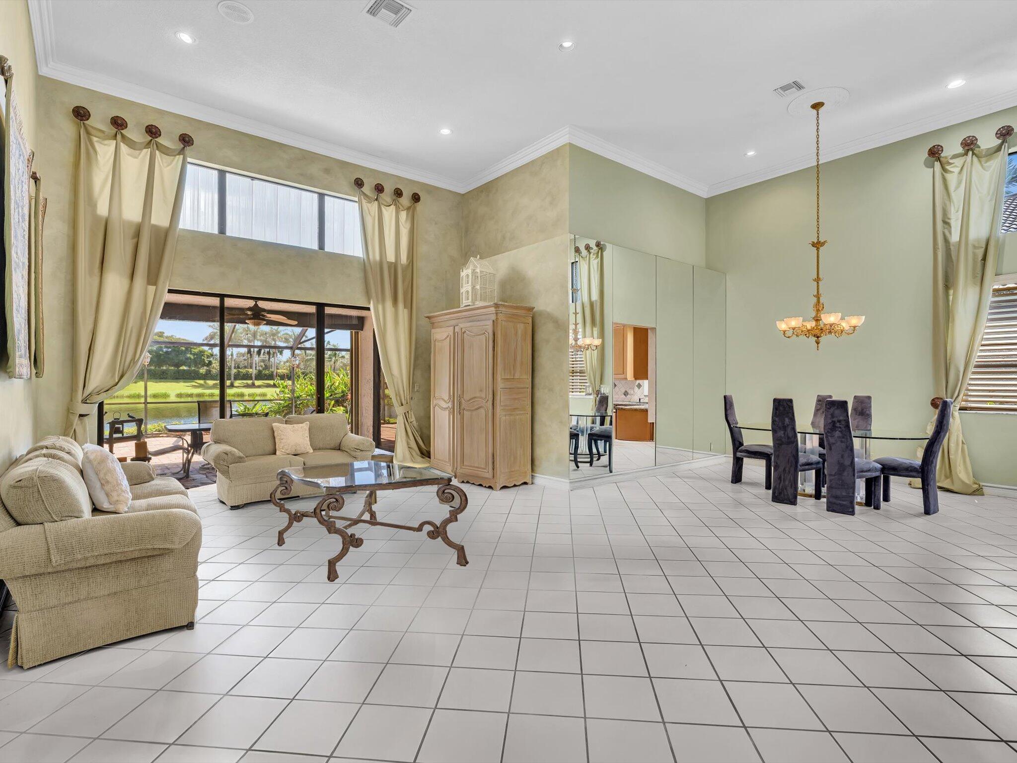 10122 Spyglass Way Boca Raton, FL 33498 - Photo 4 of 66 Living room with lake views