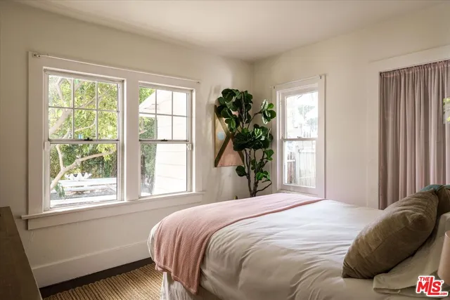 a view of a house with a tree