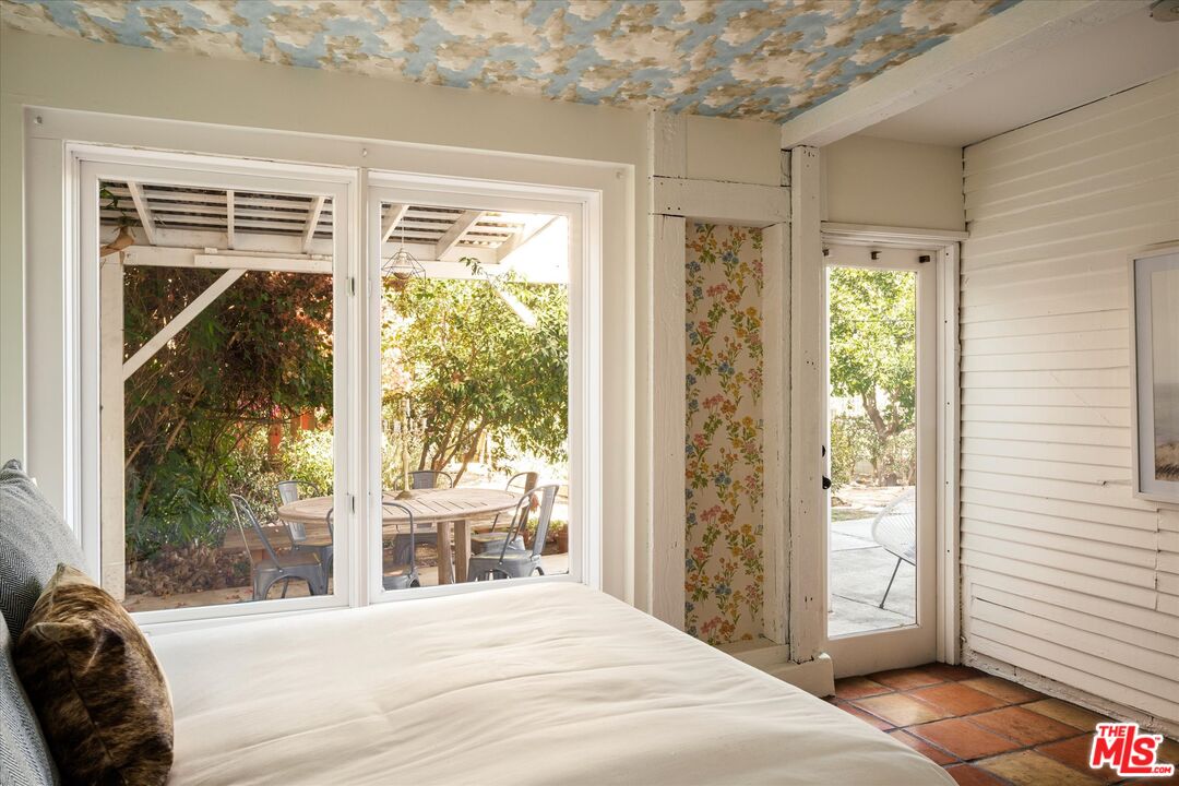 1741 Kent Street Los Angeles, CA 90026 - Photo 36 of 62 a bed sitting in a bedroom next to a window