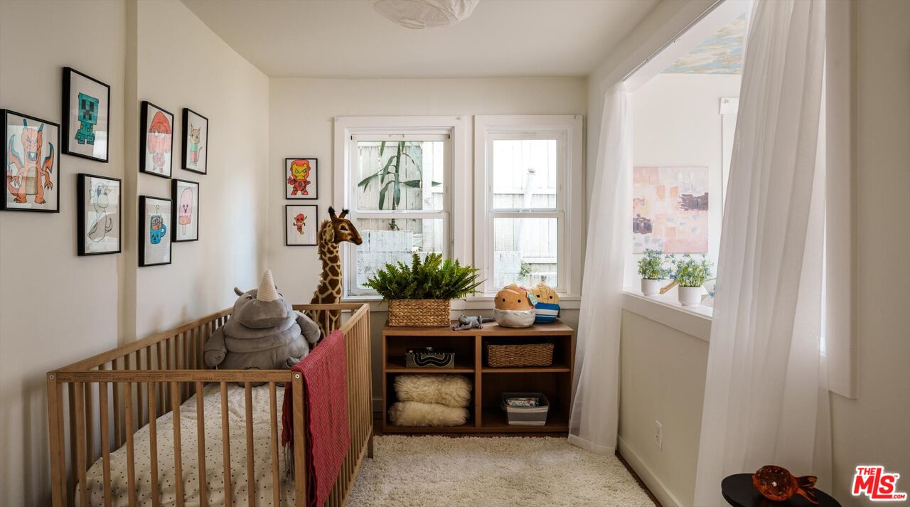 1741 Kent Street Los Angeles, CA 90026 - Photo 39 of 62 a living room with furniture and a potted plant