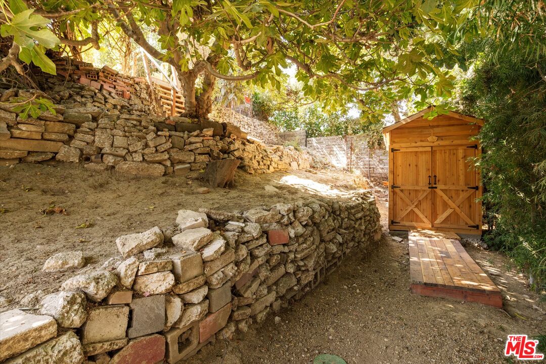 1741 Kent Street Los Angeles, CA 90026 - Photo 59 of 62 a view of a yard with wooden fence