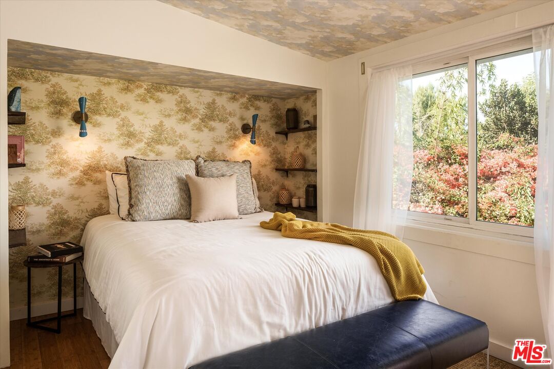 1741 Kent Street Los Angeles, CA 90026 - Photo 10 of 62 a bedroom with a bed and wooden floor