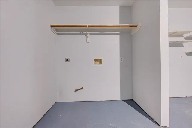 a view of a backyard with wooden fence