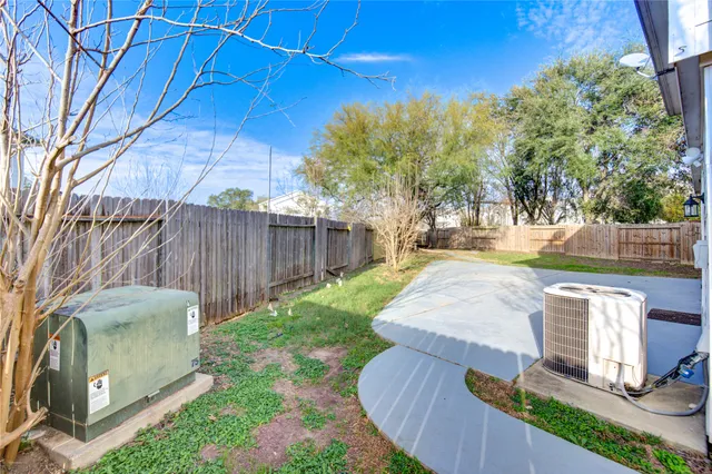 a view of a back yard of the house