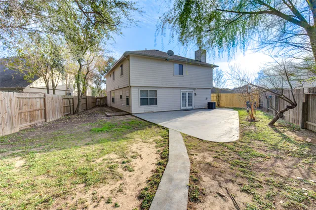 a view of a large house with a yard