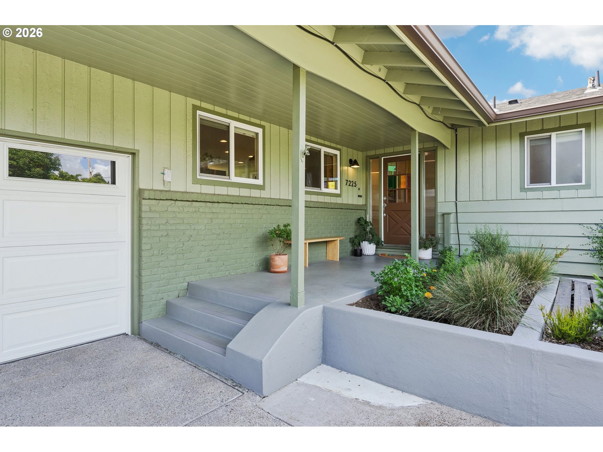 7225 Southwest 13th Avenue Portland, OR 97219 - Photo 4 of 48 a view of a house with a patio