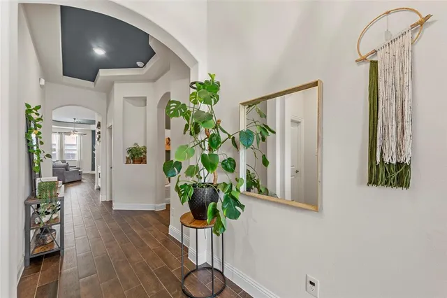 a view of entryway with wooden floor
