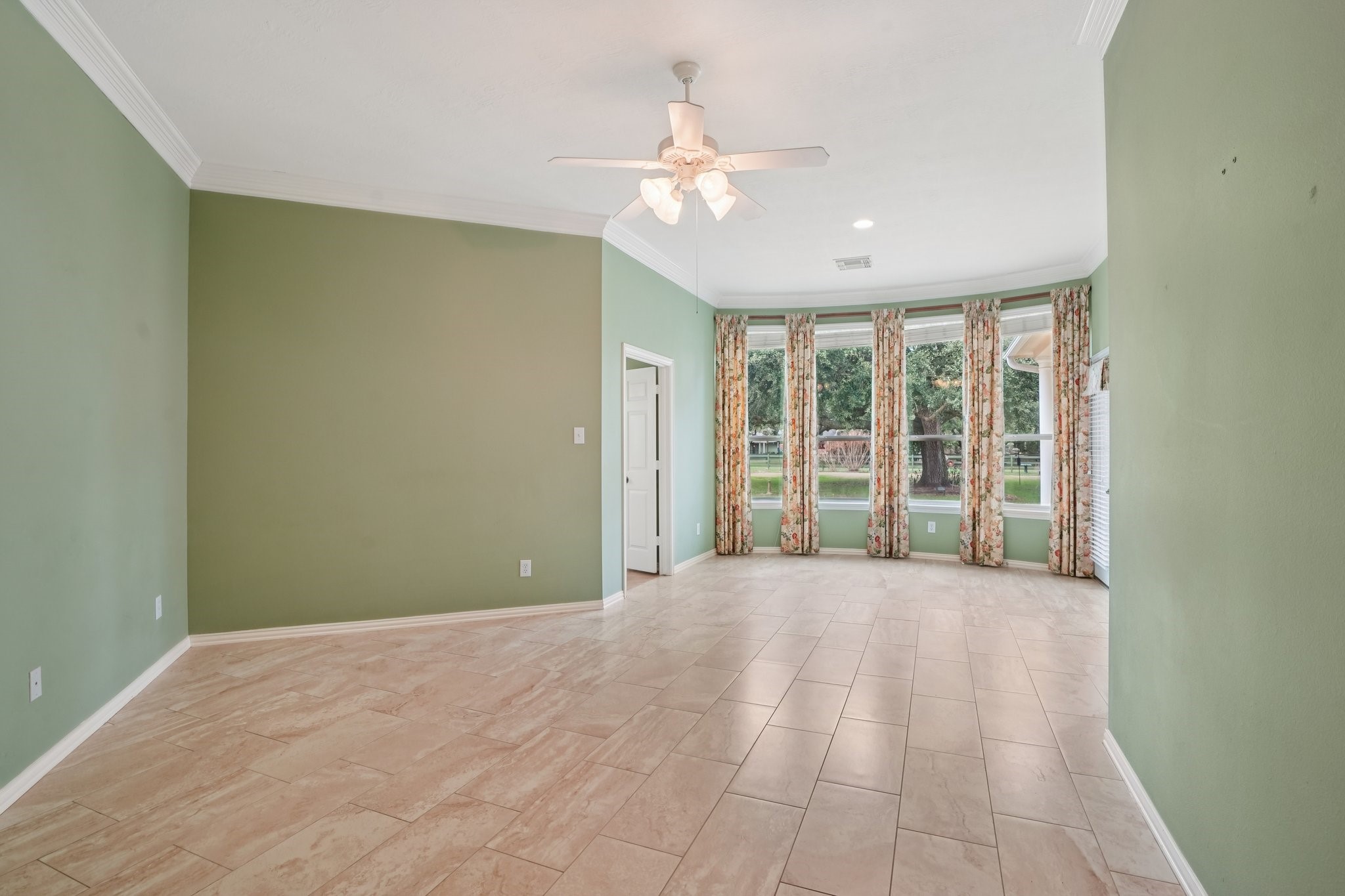 31810 Tree Farm Lane Fulshear, TX 77441 - Photo 16 of 48 a view of a room with a large window