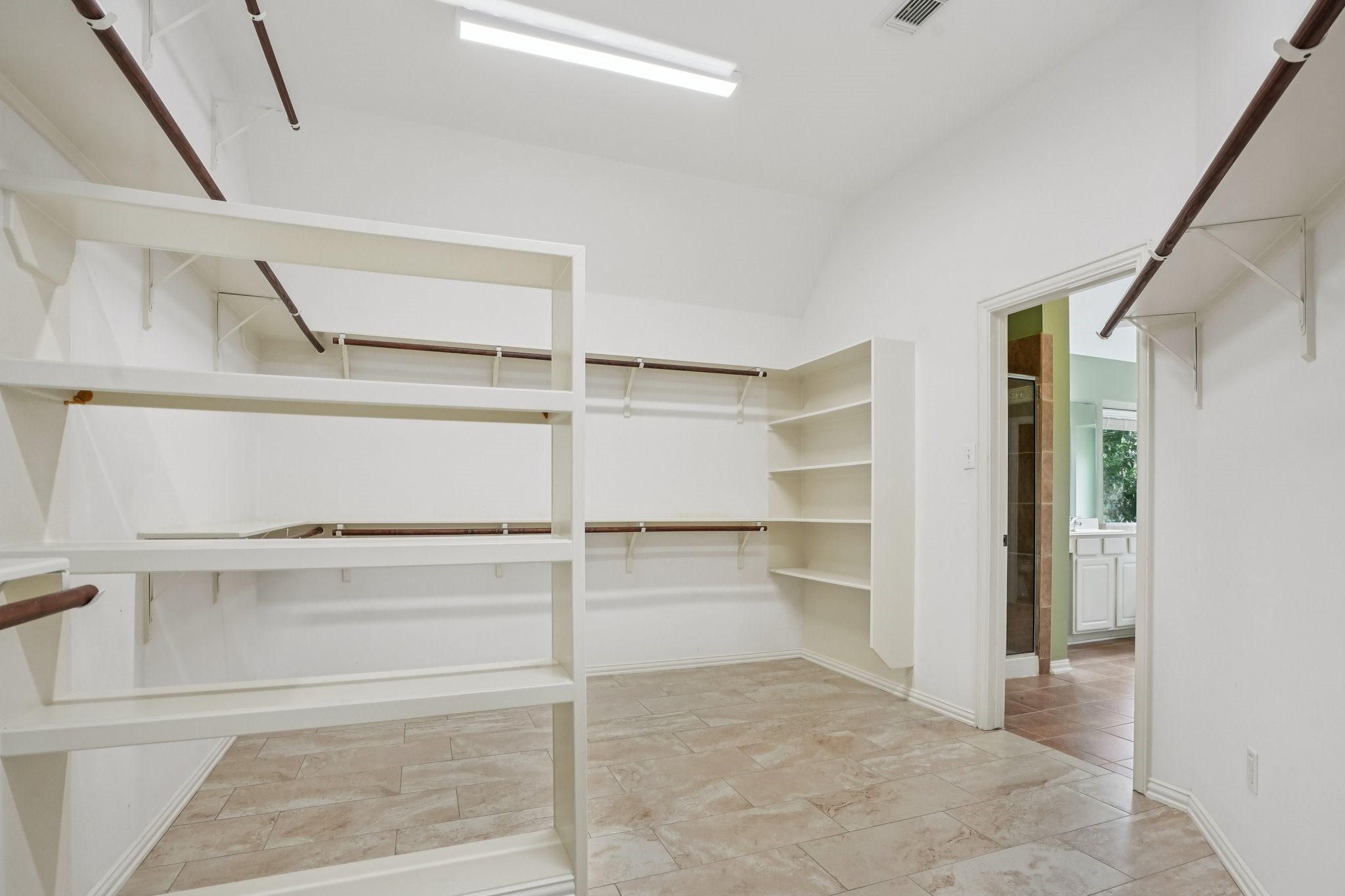 31810 Tree Farm Lane Fulshear, TX 77441 - Photo 20 of 48 a view of an empty walk in closet