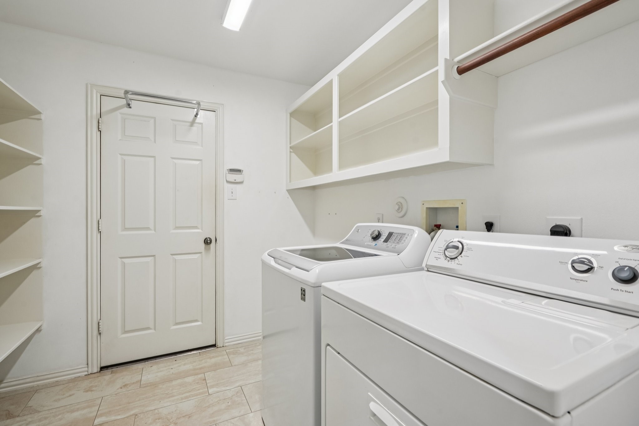 31810 Tree Farm Lane Fulshear, TX 77441 - Photo 26 of 48 a utility room with dryer and washer