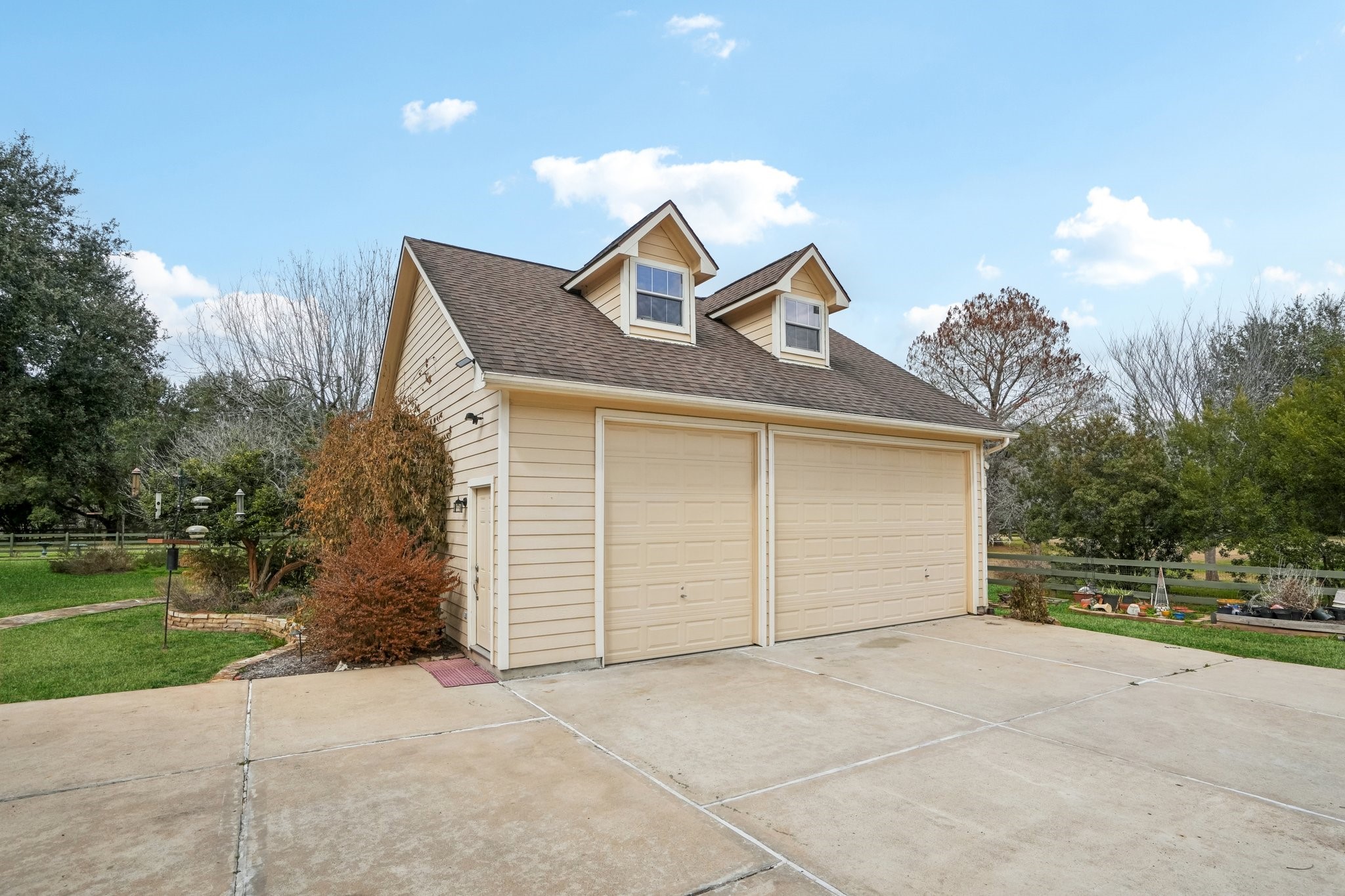 31810 Tree Farm Lane Fulshear, TX 77441 - Photo 33 of 48 front view of a house with a yard and garage