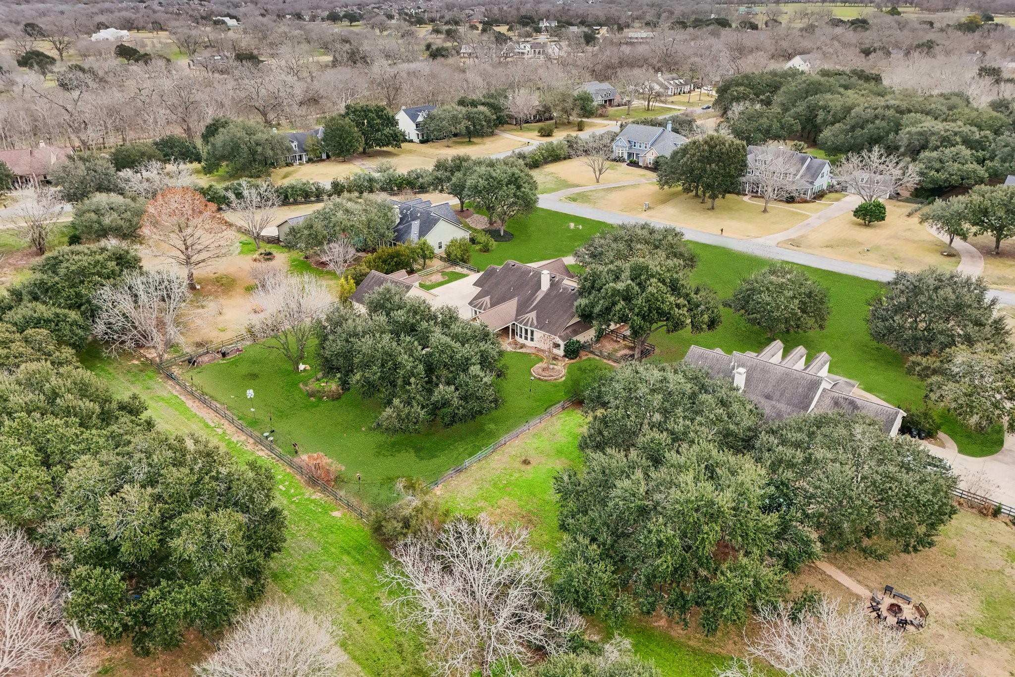 31810 Tree Farm Lane Fulshear, TX 77441 - Photo 38 of 48 an aerial view of residential houses with outdoor space