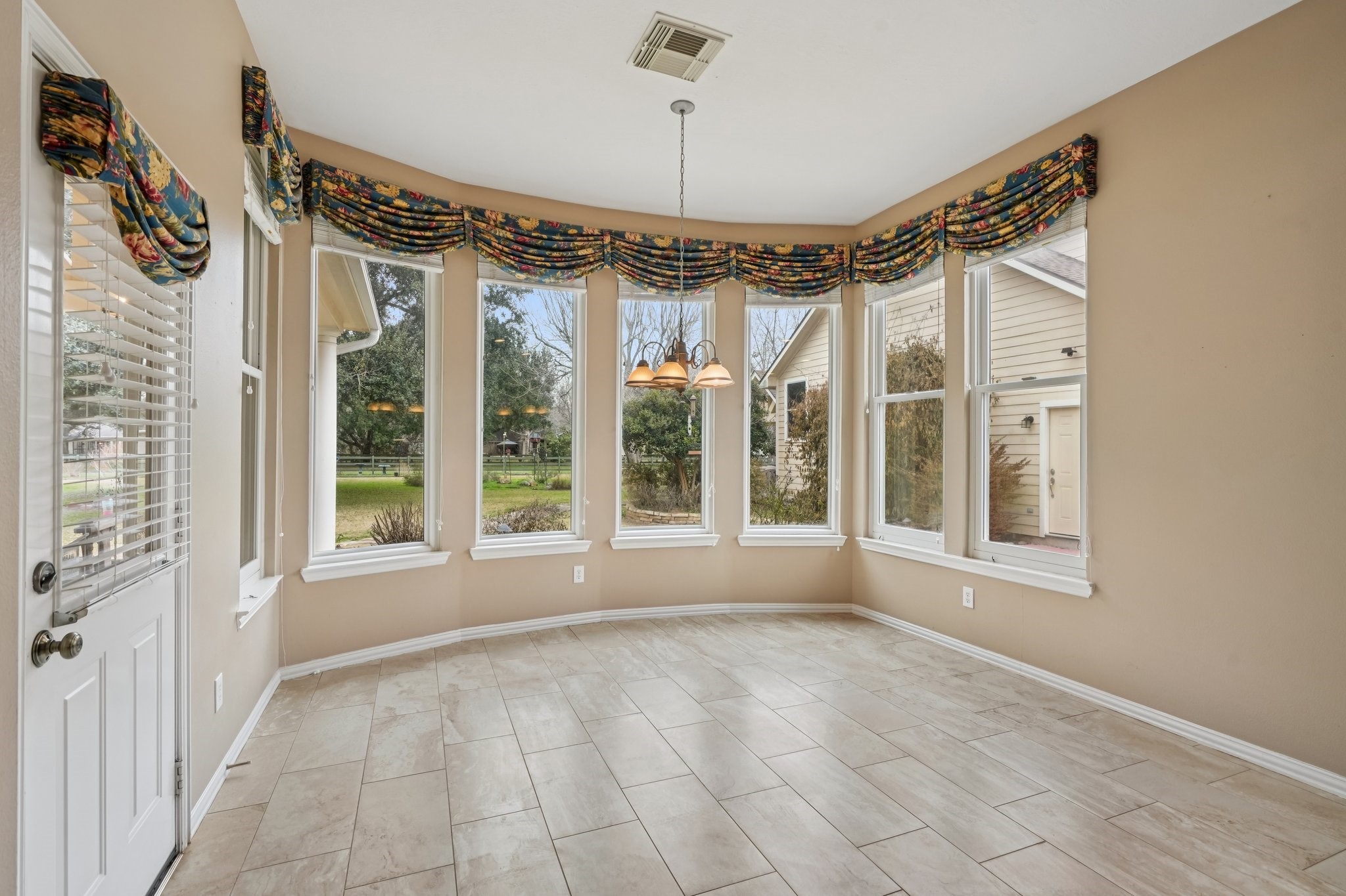 31810 Tree Farm Lane Fulshear, TX 77441 - Photo 3 of 48 a view of an empty room with a window