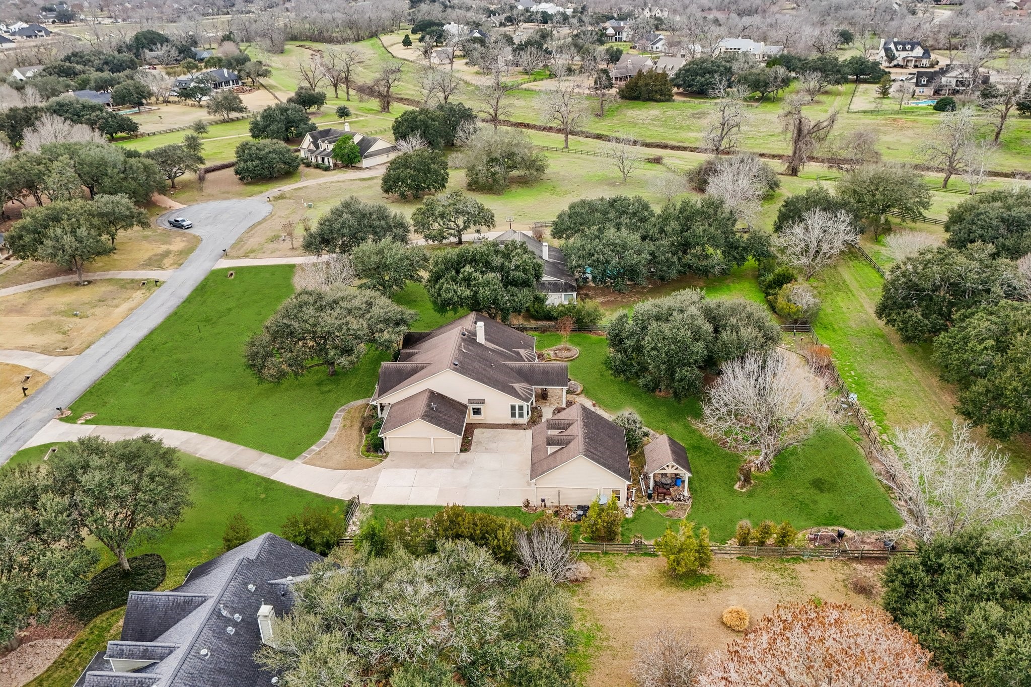 31810 Tree Farm Lane Fulshear, TX 77441 - Photo 40 of 48 an aerial view of a house with a lake view