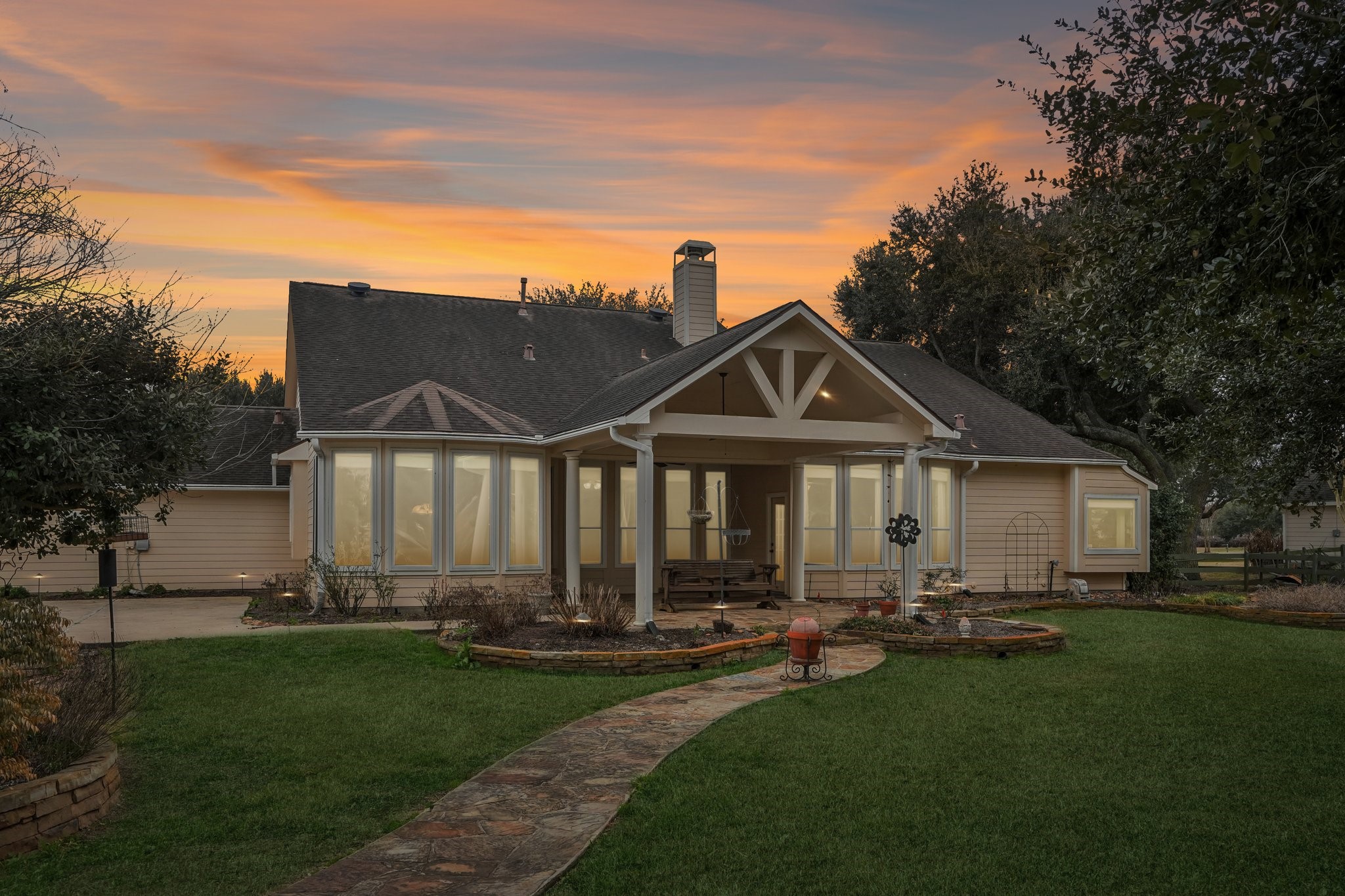 31810 Tree Farm Lane Fulshear, TX 77441 - Photo 46 of 48 a front view of house with yard and green space