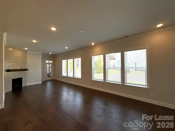 a kitchen with kitchen island a sink stainless steel appliances and cabinets
