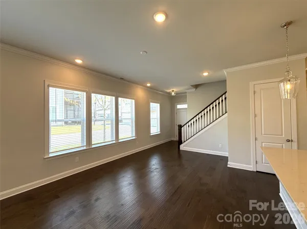 a spacious bathroom with a large tub and sink