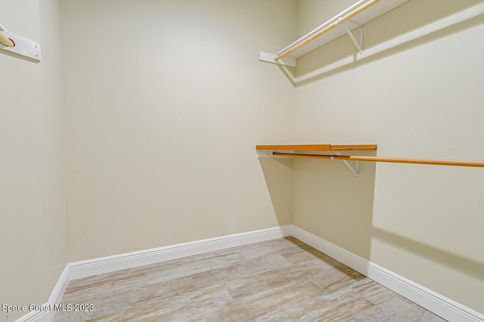 618 Hammock Road Melbourne, FL 32904 - Photo 23 of 59 a view of a room with racks on the wall