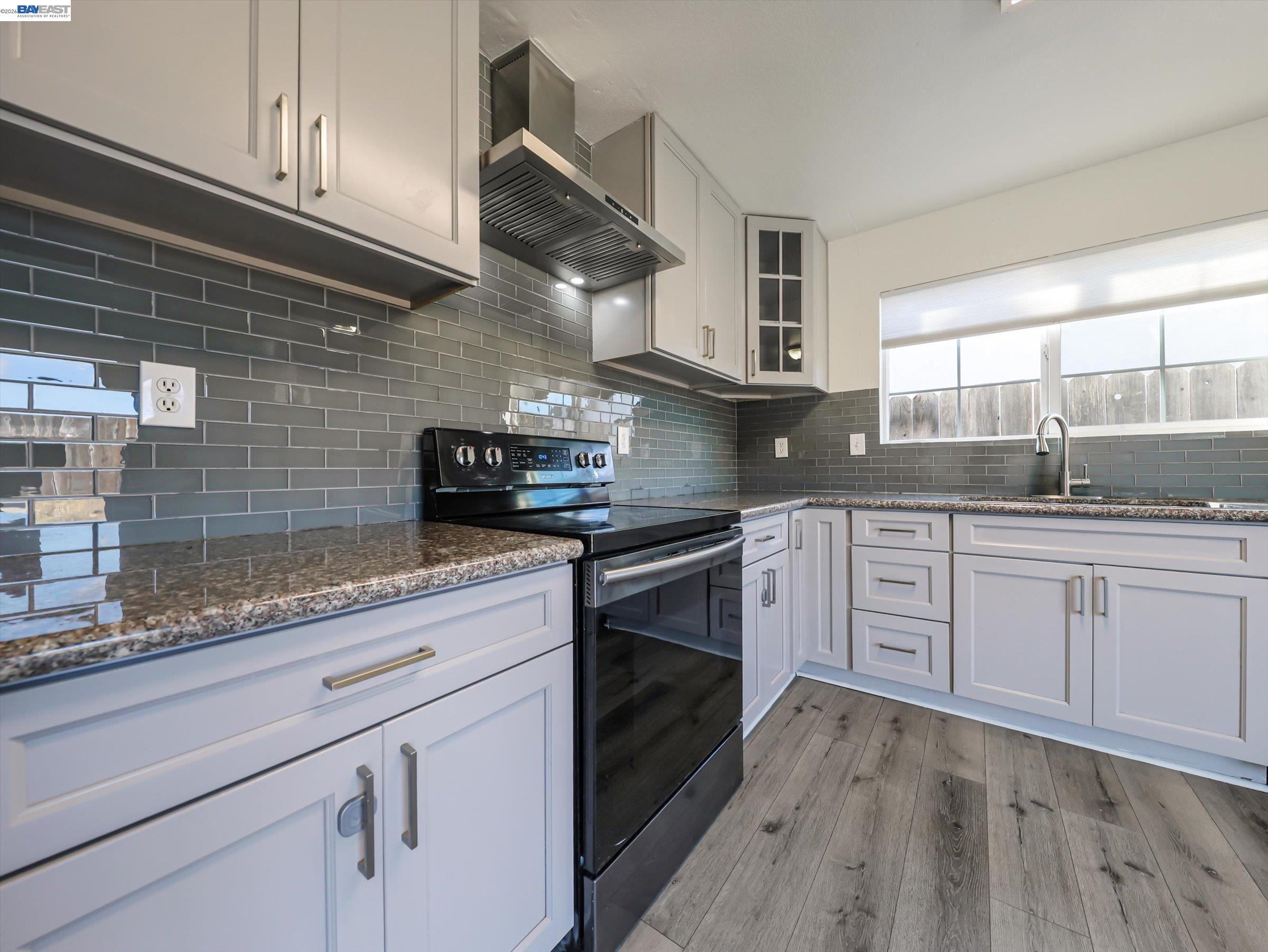 3432 Danielle Place Bay Point, CA 94565 - Photo 13 of 36 a kitchen with stainless steel appliances granite countertop a sink a stove and cabinets