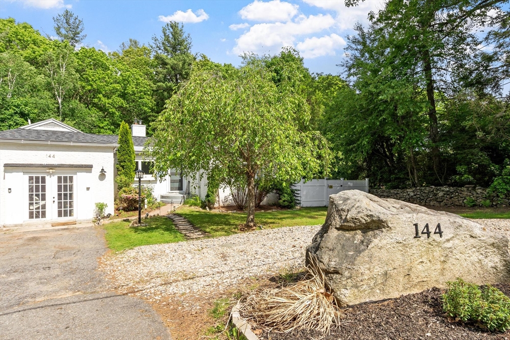 144 Bailey Road Holden, MA 01520 - Photo 41 of 42 a view of a yard with plants