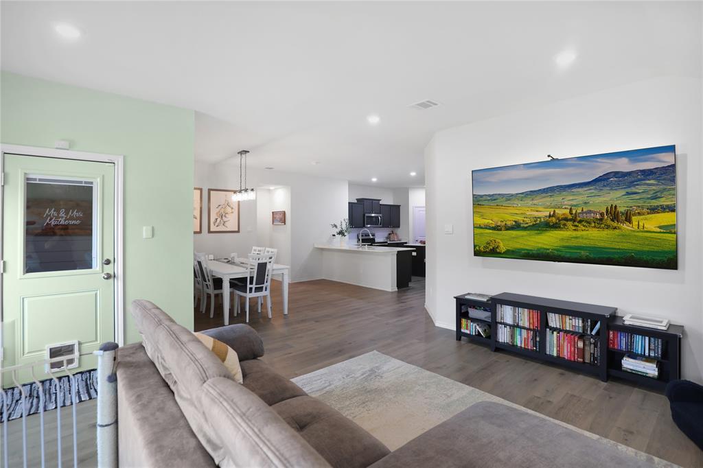 6538 Diver Street Princeton, TX 75407 - Photo 13 of 31 Living room with recessed lighting and dark wood-type flooring