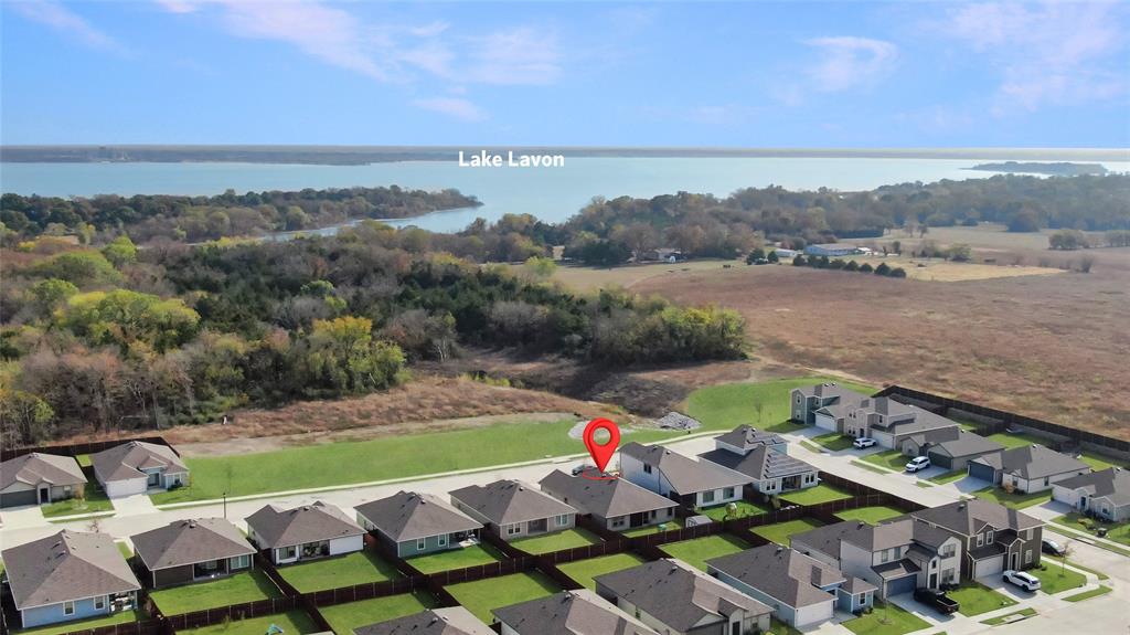 6538 Diver Street Princeton, TX 75407 - Photo 3 of 31 Aerial view of residential area featuring a nearby body of water