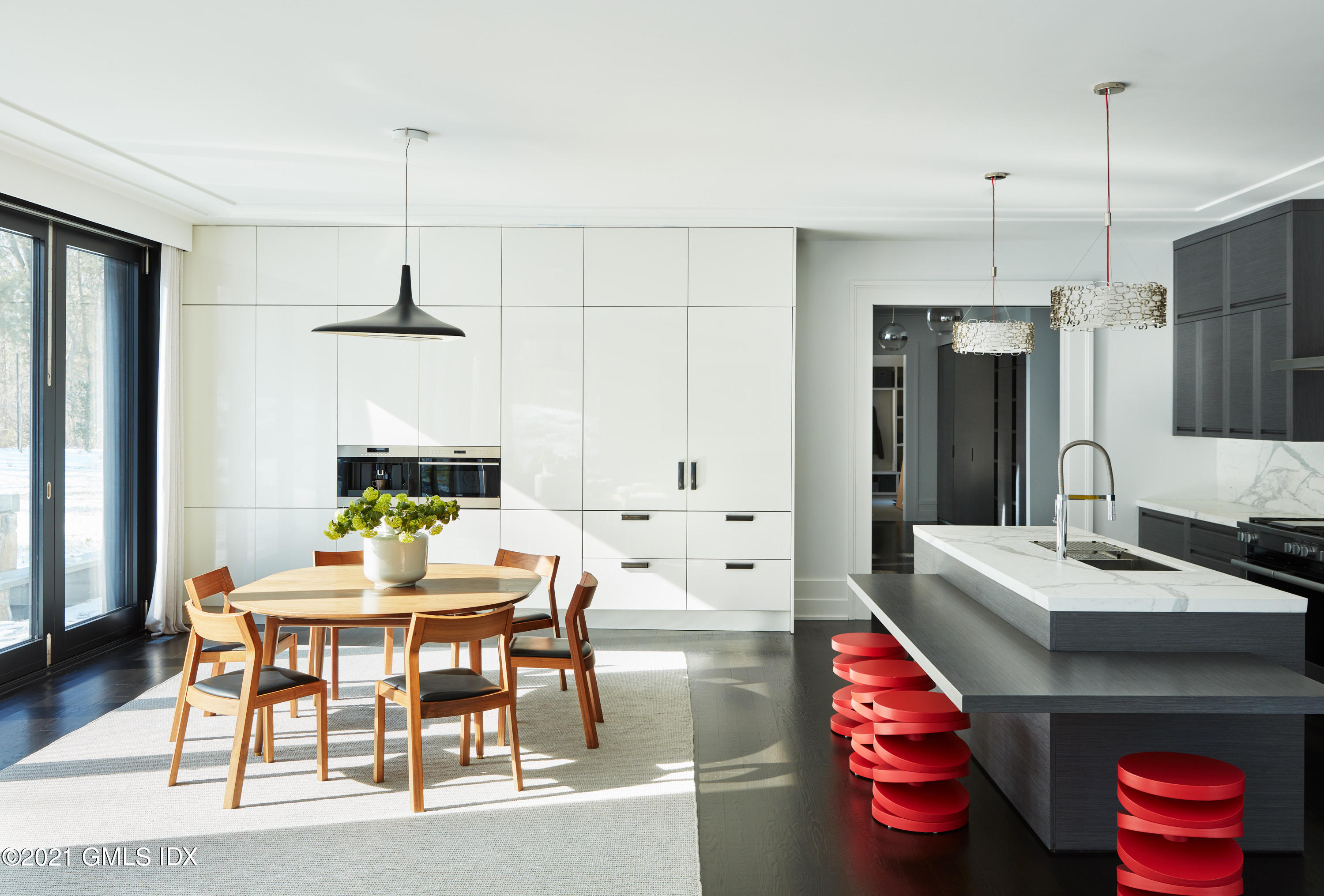 45 Husted Lane Greenwich, CT 06830 - Photo 6 of 11 a kitchen with a appliances and dining table