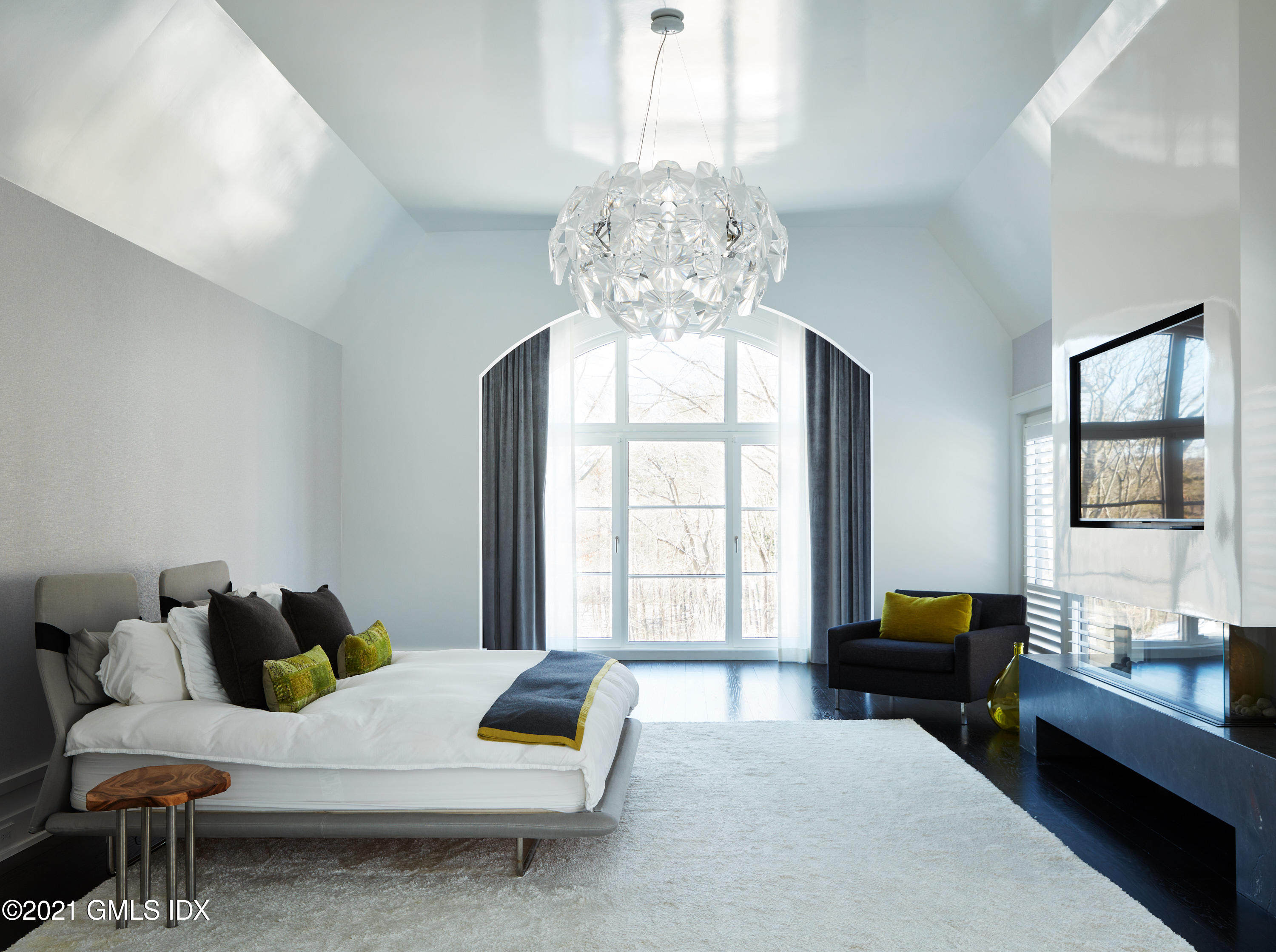 45 Husted Lane Greenwich, CT 06830 - Photo 8 of 11 a living room with furniture and a chandelier