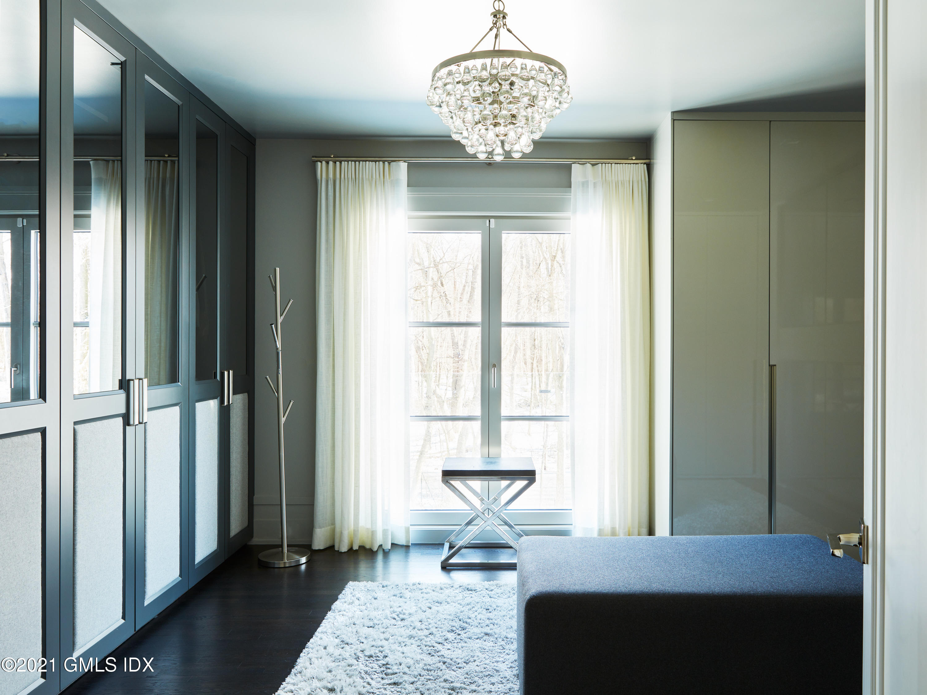 45 Husted Lane Greenwich, CT 06830 - Photo 10 of 11 a view of a livingroom with a window and wooden floor
